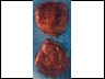 BBQ sauce brushed Bacon wrapped onion cheeseburger